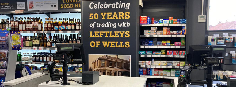 Celebrating half a century in Norfolk in store counter with tills and pay points