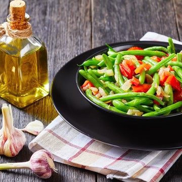 Sautéed green beans and tomatoes