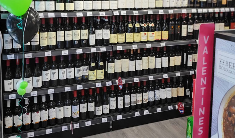 Nisa partner in Surrey reopens village store after devastating fire on shelf wines fully stocked