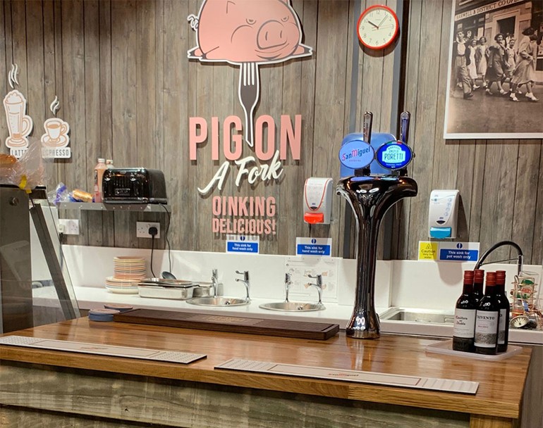 Pint of beer and a basket of shopping Pig on a Fork Bar