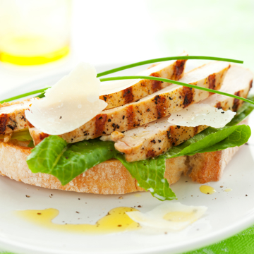 Open chicken caesar sandwich