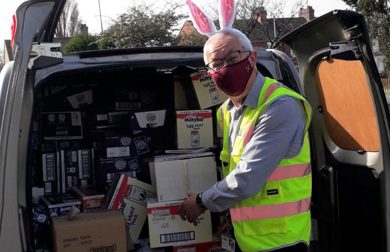 Bourne Leisure donates over 44,000 Easter treats to good causes loading stock into van